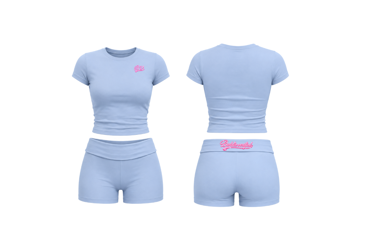 Light blue athletic outfit with pink branding on a white background 